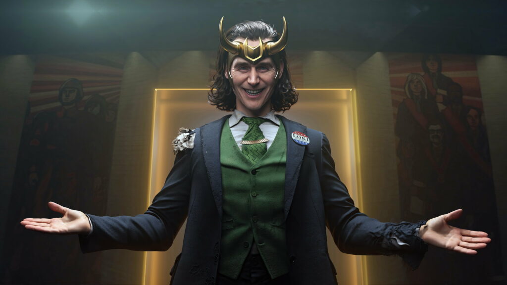 Mischief Unleashed: Loki's Enigmatic Grin in the 2021 TV Series Wallpaper