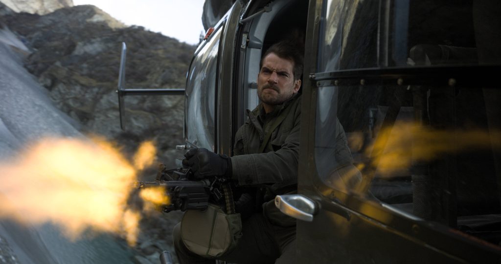 Henry Cavill as August Walker firing machine gun from helicopter in Mission Impossible Fallout wallpaper