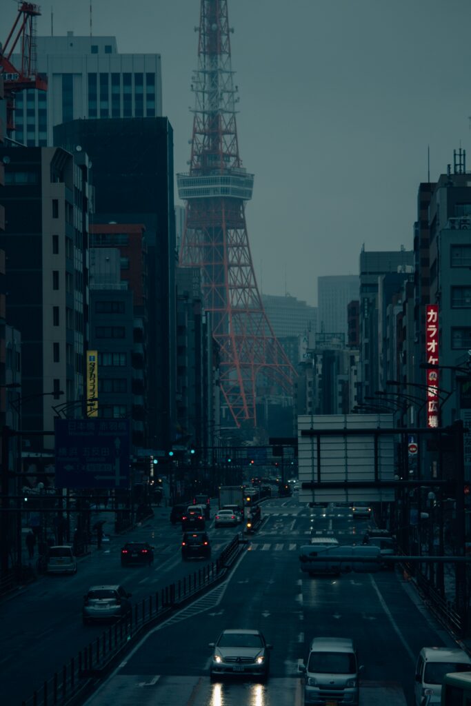Misty Cityscape Wallpaper: Captivating Urban Scene with Red Tower