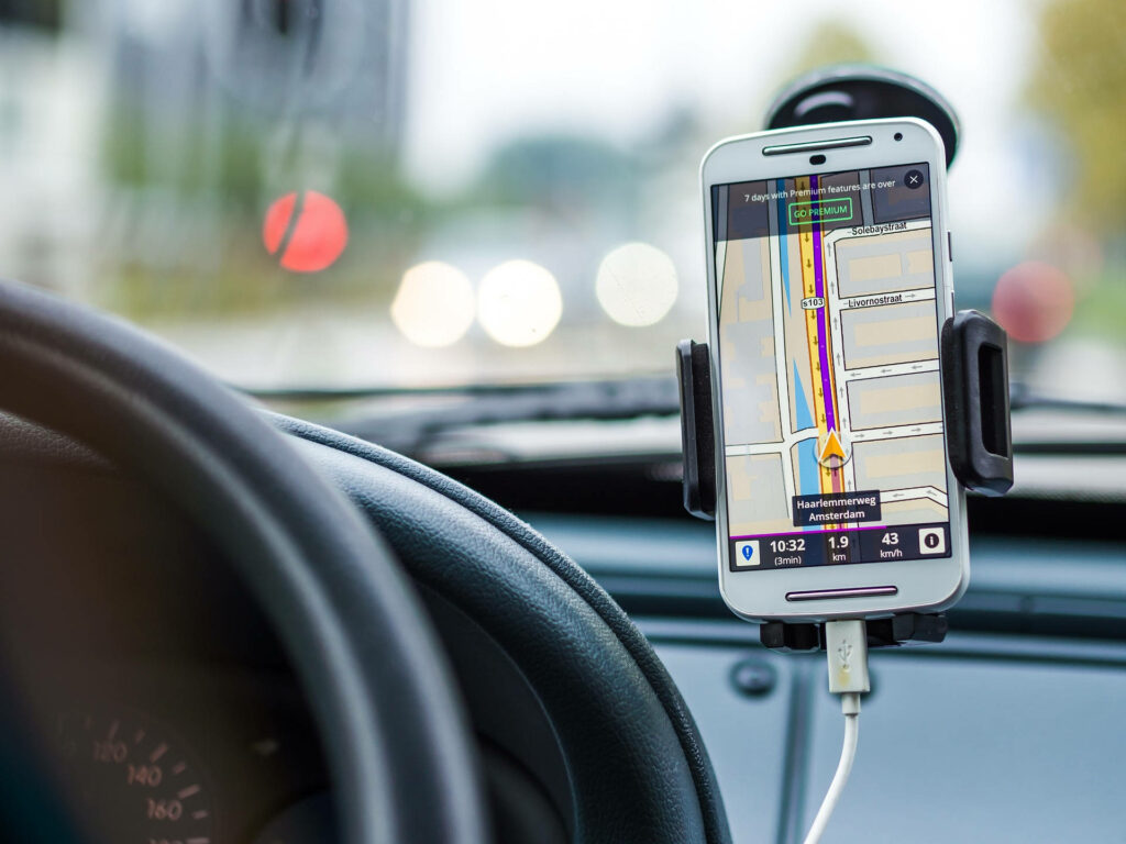 Mobile Phone Navigation on Car Dashboard - Wallpaper Background