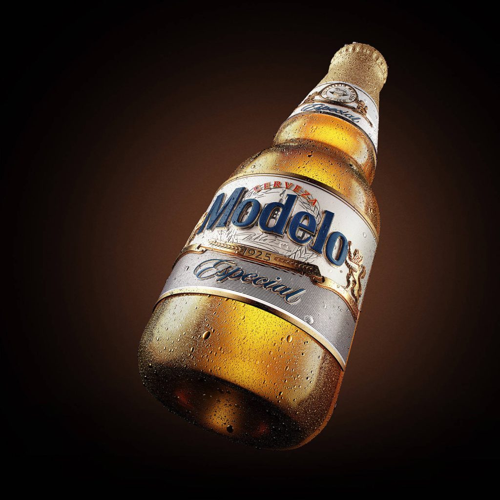 3D render of Modelo Especial beer bottle with condensation against dark moody background wallpaper