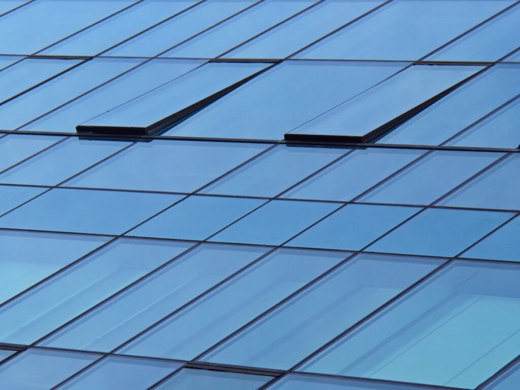 Modern Abstract Wallpaper: Geometric Blue Glass Windows Background
