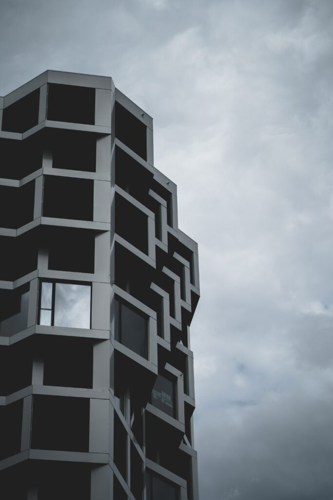 Modern Architectural Facade with Geometric Patterns & Symmetry Wallpaper
