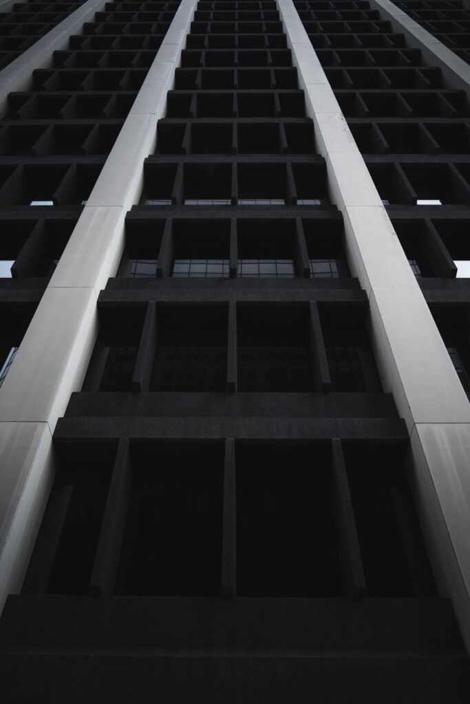 Striking Black and White Wallpaper of Modern Building Facade