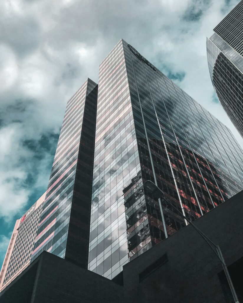 Modern Architectural Wallpaper: Tall Glass Buildings & Urban Elegance