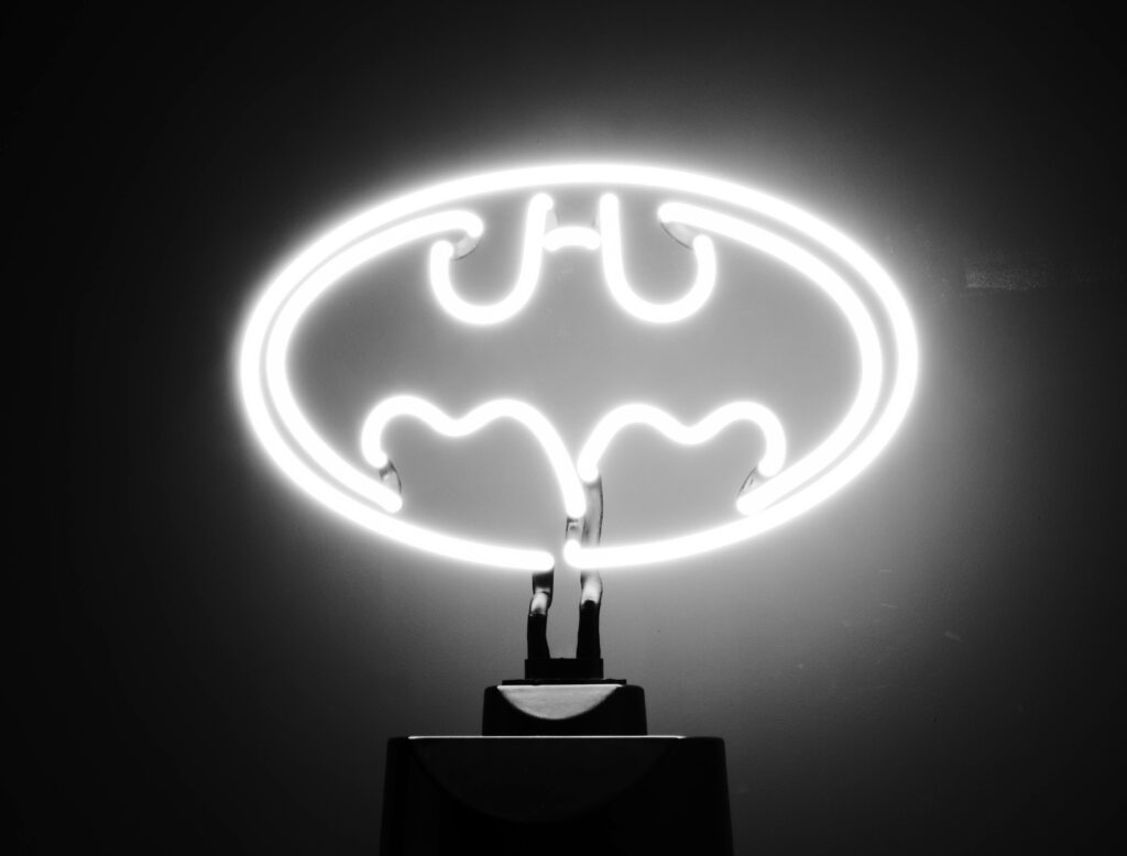 Modern Batman Logo Wallpaper: White Neon on Dark Background