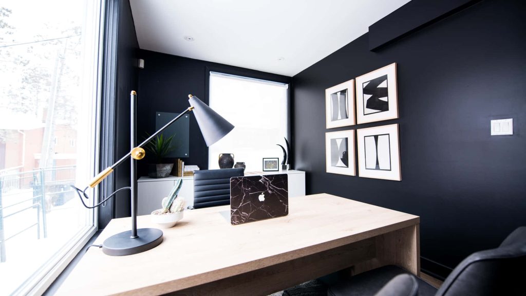 Modern home office Zoom wallpaper with black interior laptop marble case and natural light