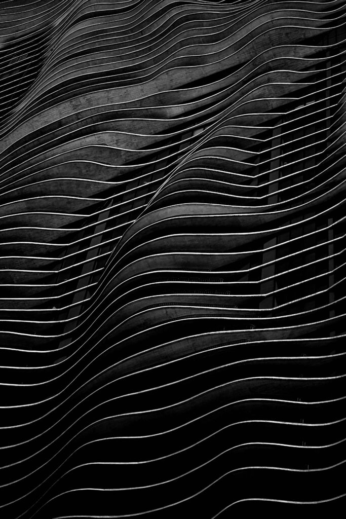Modern Black Wavy Lines Wallpaper: Depth & Texture Background