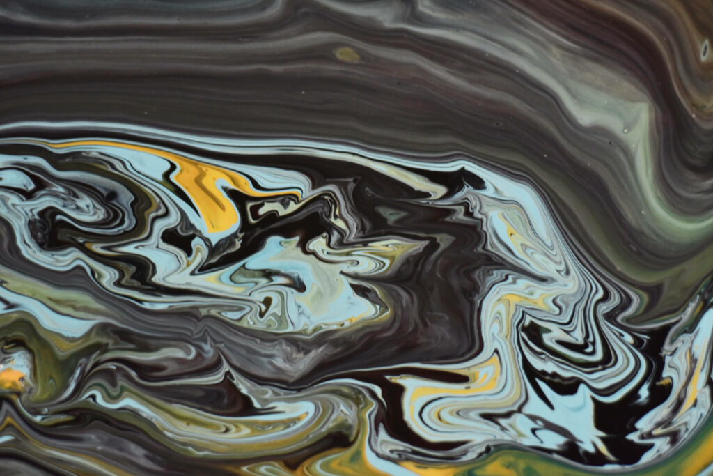 Abstract Liquid Pattern Wallpaper: Black, Yellow & Blue Marbled Design