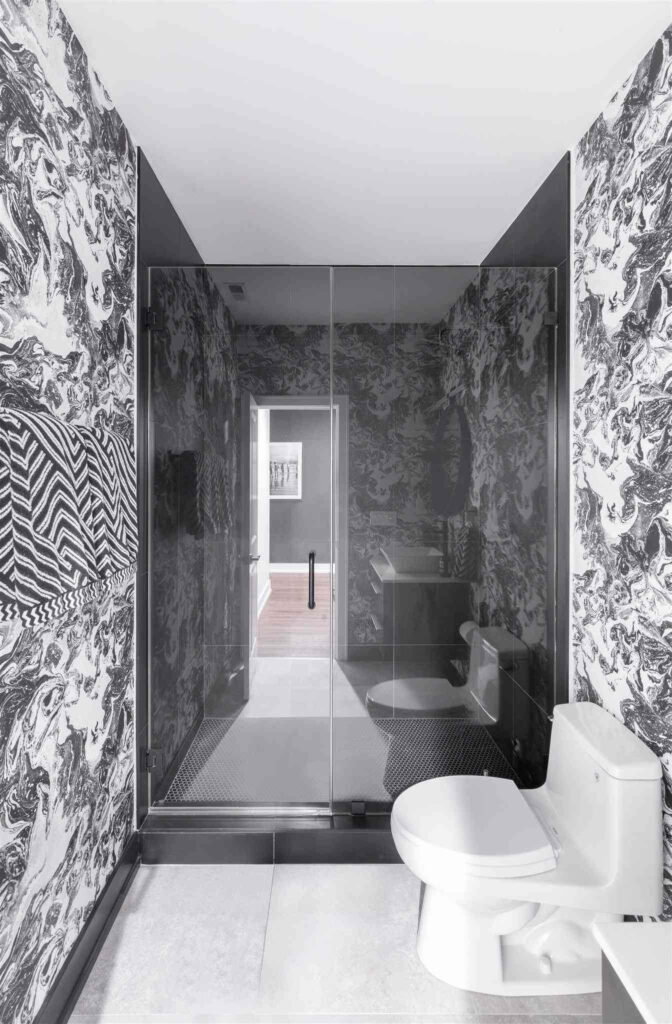 Bold Black and White Wallpaper for a Sleek Modern Bathroom Aesthetic