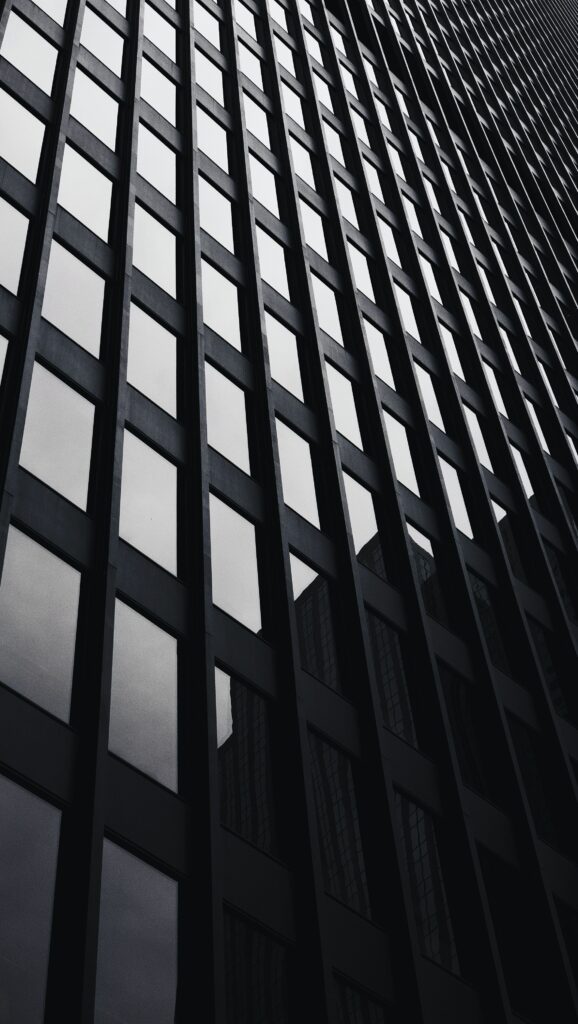 High-Contrast Black & White Building Facade Wallpaper Background