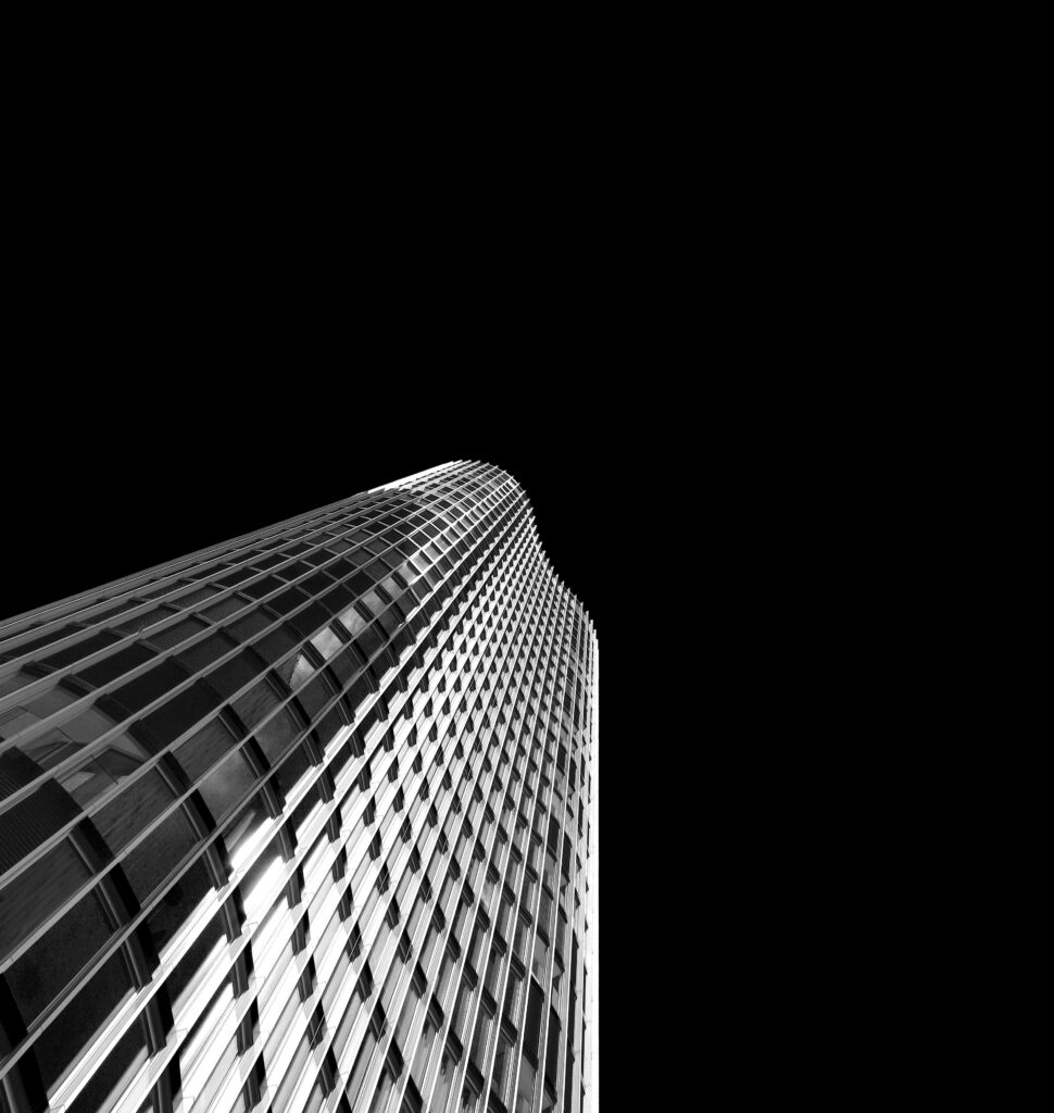 Modern Skyscraper Facade: Black and White Wallpaper Design