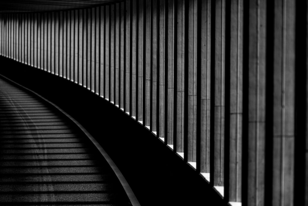 Abstract Black and White Tunnel Wallpaper with Rhythmic Lines