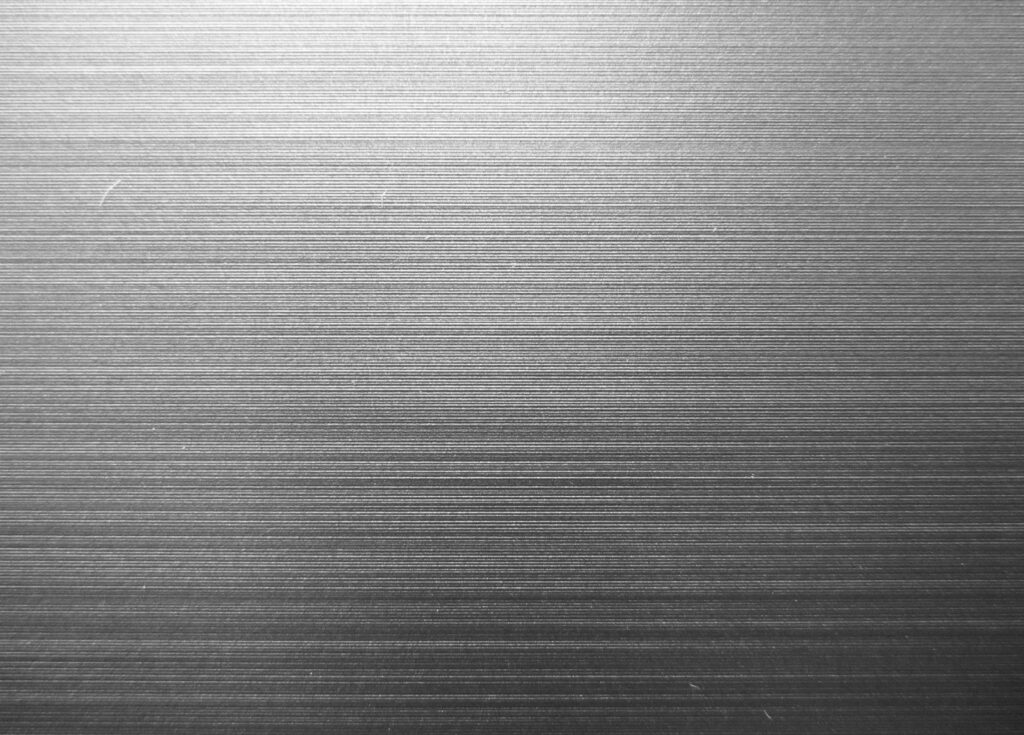 Sleek Brushed Steel Wallpaper: Modern Metallic Texture Background