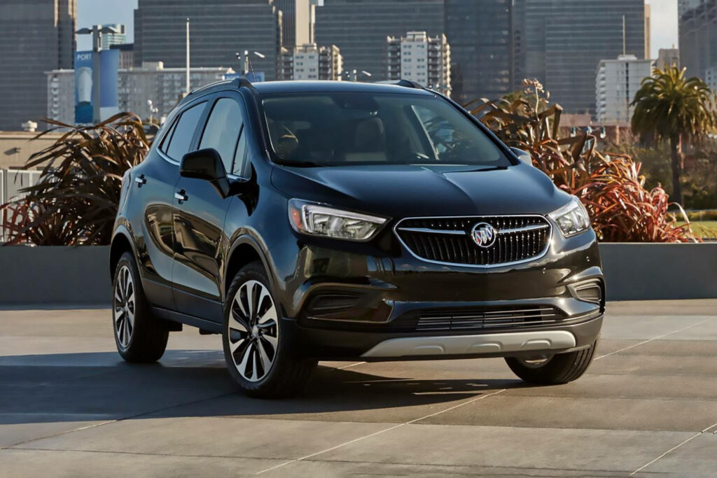 Modern Buick Encore subcompact SUV parked in urban cityscape showcasing stylish compact design Wallpaper