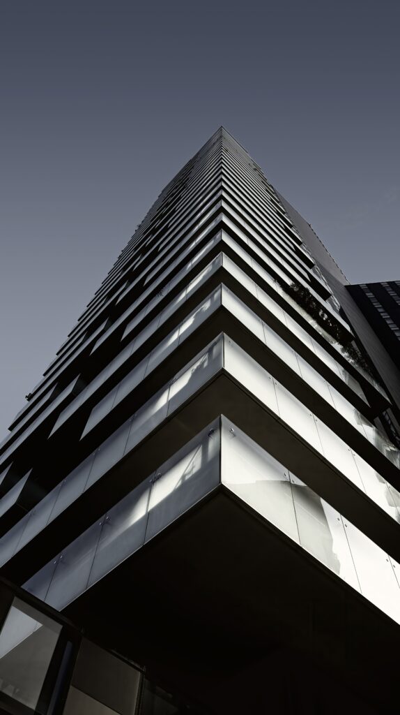 Modern Building Facade Wallpaper with Sleek Lines & Geometric Patterns