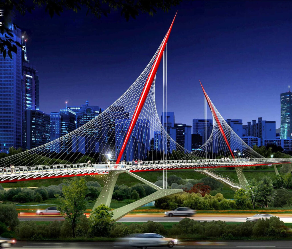 Modern cable-stayed bridge lit with red and white lights at night in a vibrant cityscape wallpaper
