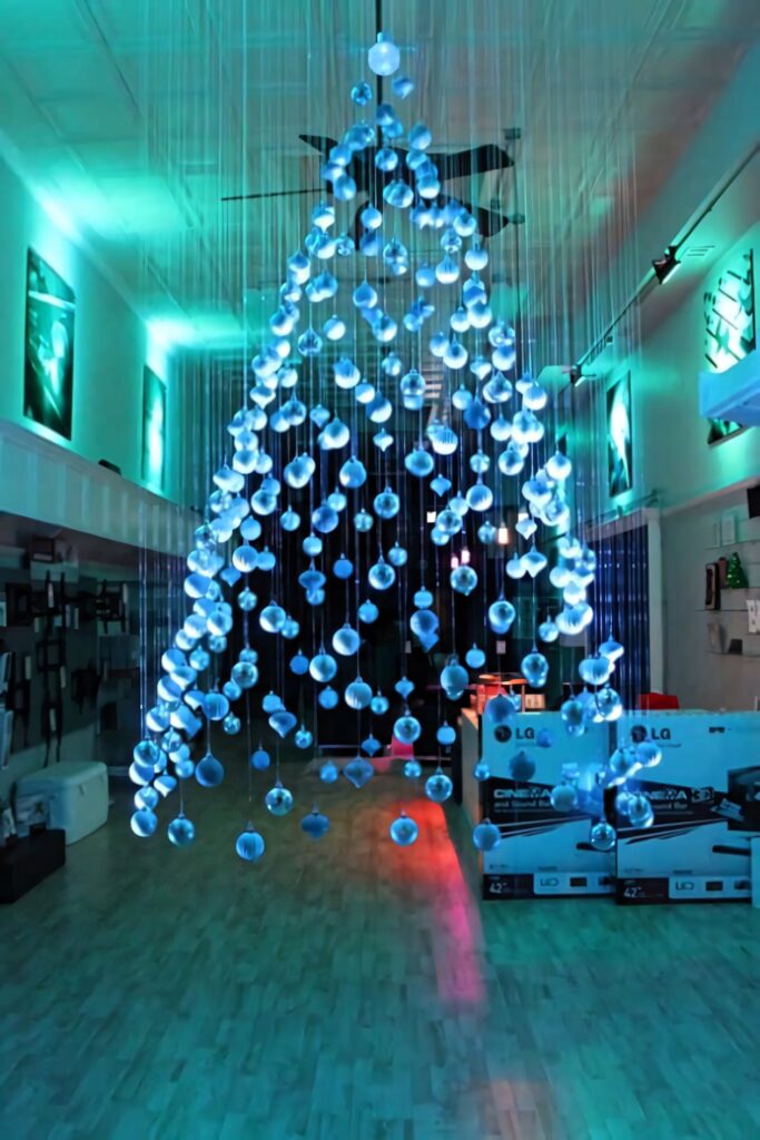 “Contemporary Christmas Tree Wallpaper: Illuminated Orb Design”