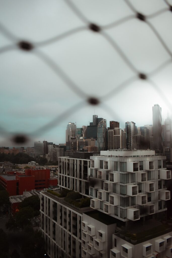 Modern Cityscape Wallpaper: Contemporary Architecture & Subtle Blur