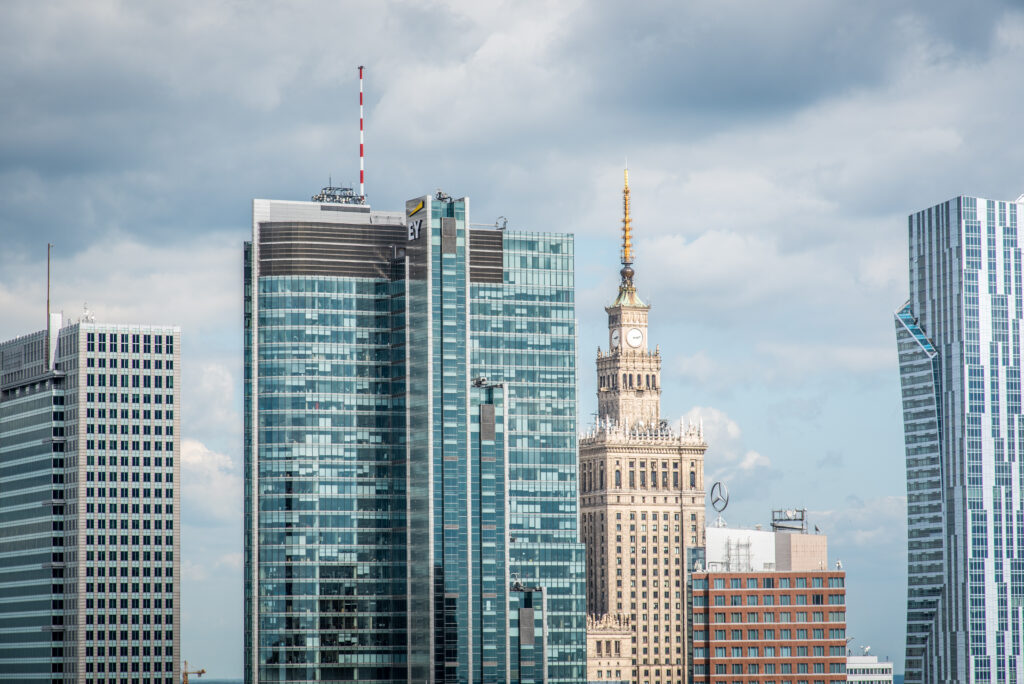 Cityscape Wallpaper: Modern High-Rises & Historic Clock Tower