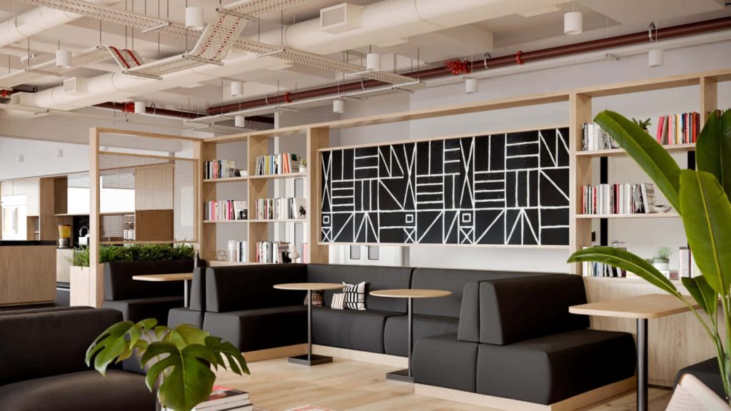 Modern collaborative office Zoom background with black sofas wooden shelves and abstract wall art Wallpaper