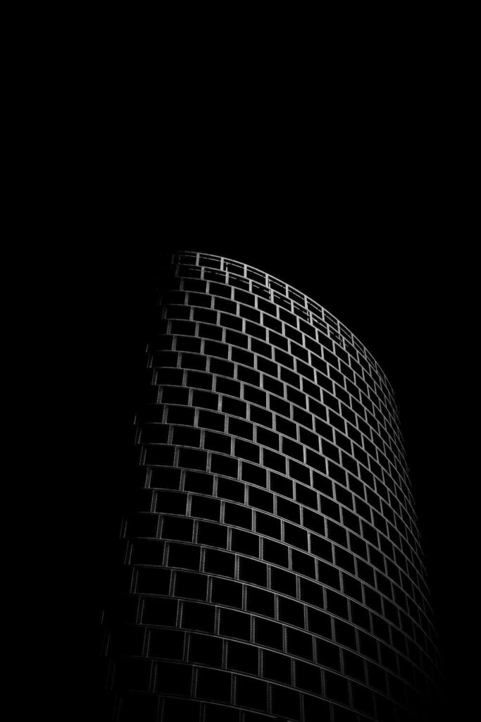Modern Curved Building Wallpaper - Bold Black & White Design