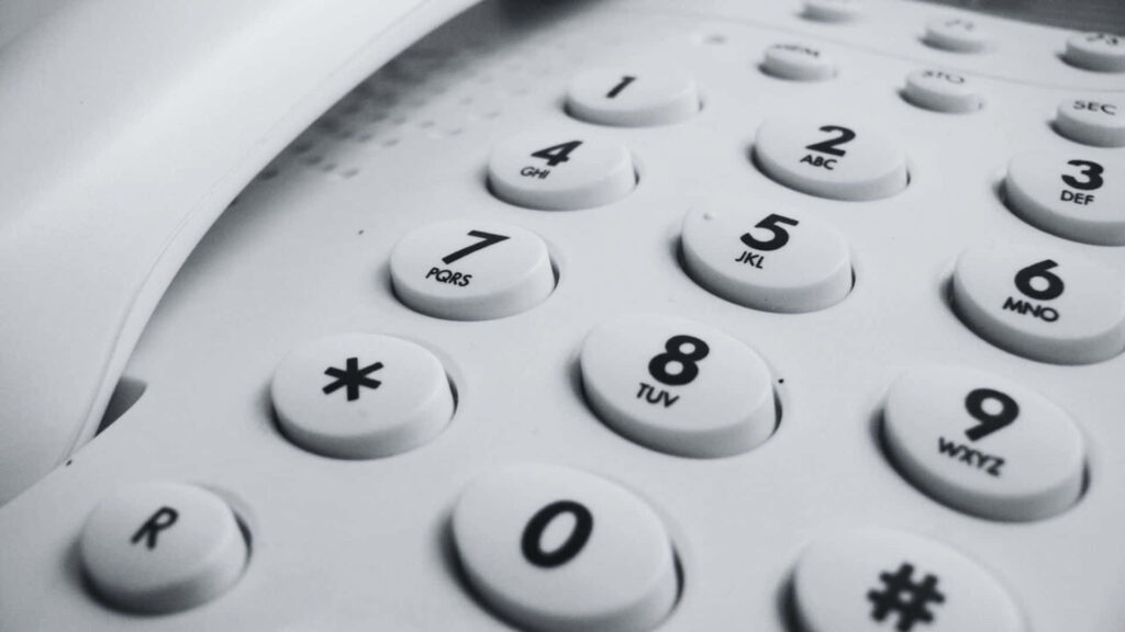 Minimalist Telephone Dial Pad Wallpaper: Bold Black Numbers & White