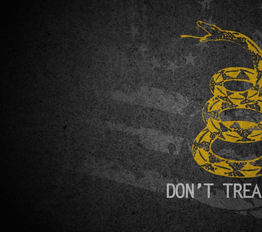 Modern grunge Gadsden Flag wallpaper with coiled yellow rattlesnake on dark textured background