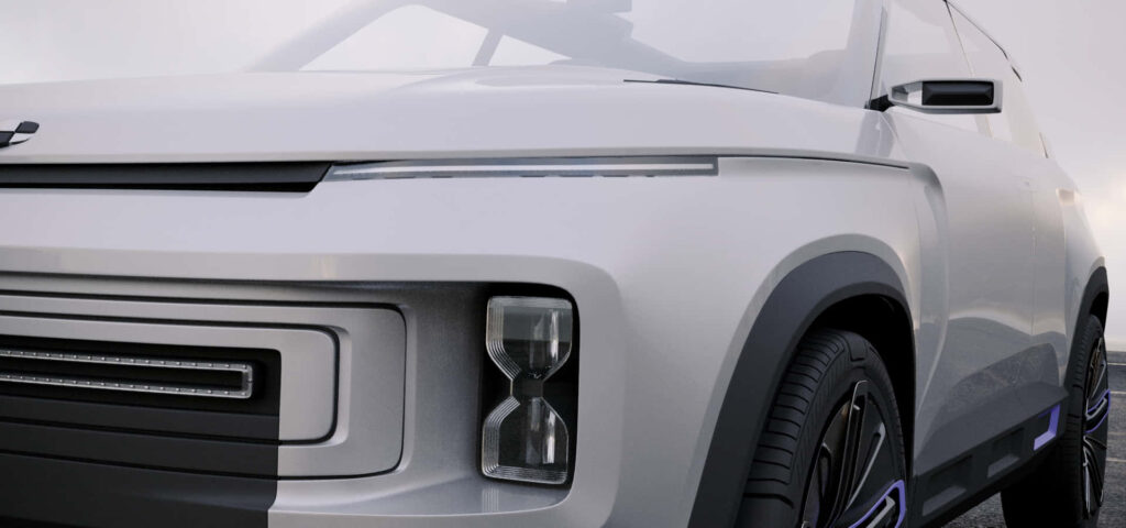 Futuristic Geely Icon SUV Close-Up: Sleek Design in Wilderness Wallpaper