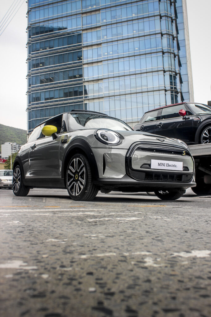 Sleek Gray MINI Electric Car in Urban Setting - Modern Wallpaper