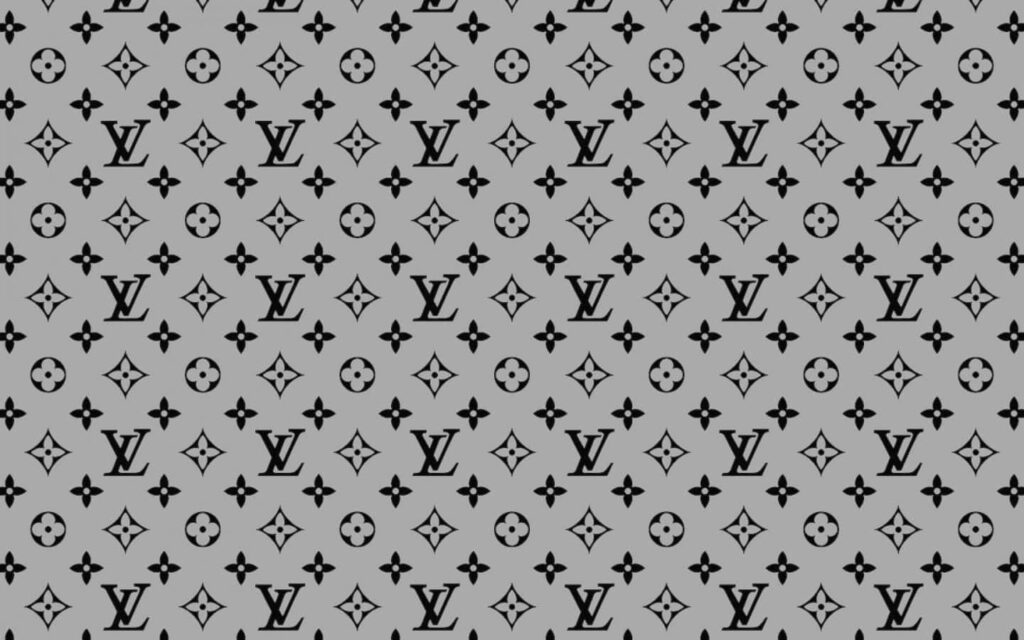 Gray wallpaper with repeating black Louis Vuitton monogram pattern luxurious modern background