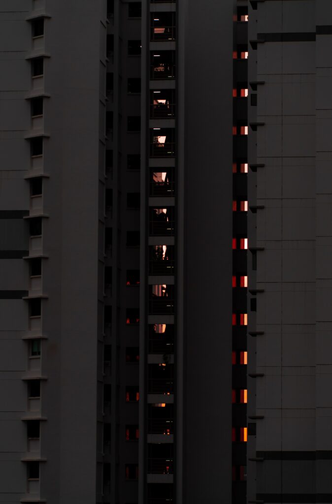 Modern High-Rise Evening Wallpaper: Urban Glow & Moody Aesthetic