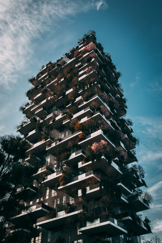 Modern High-Rise Wallpaper: Greenery-Filled Vertical Forest Design