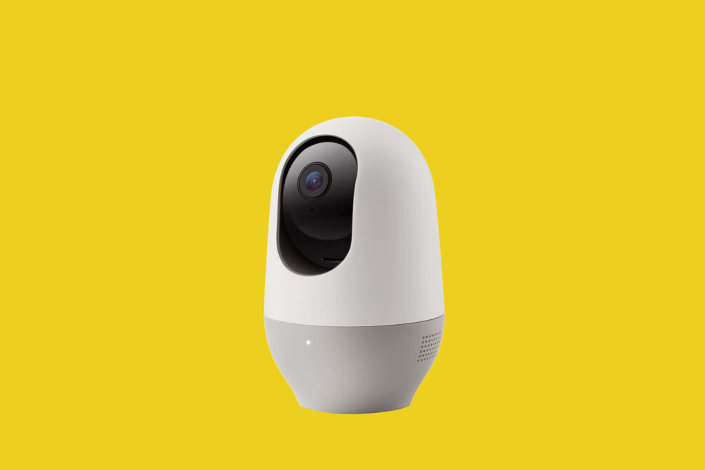 High-Tech Indoor Security Camera Wallpaper - Minimalist Design on Yellow