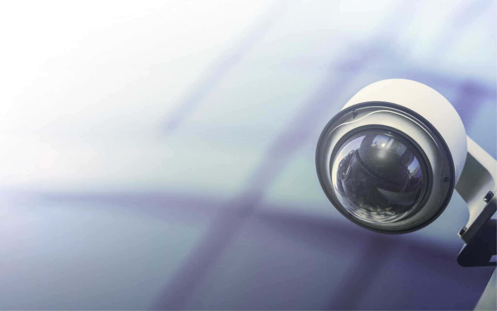 Modern Outdoor Infrared PTZ Camera Against Sleek Architecture Wallpaper