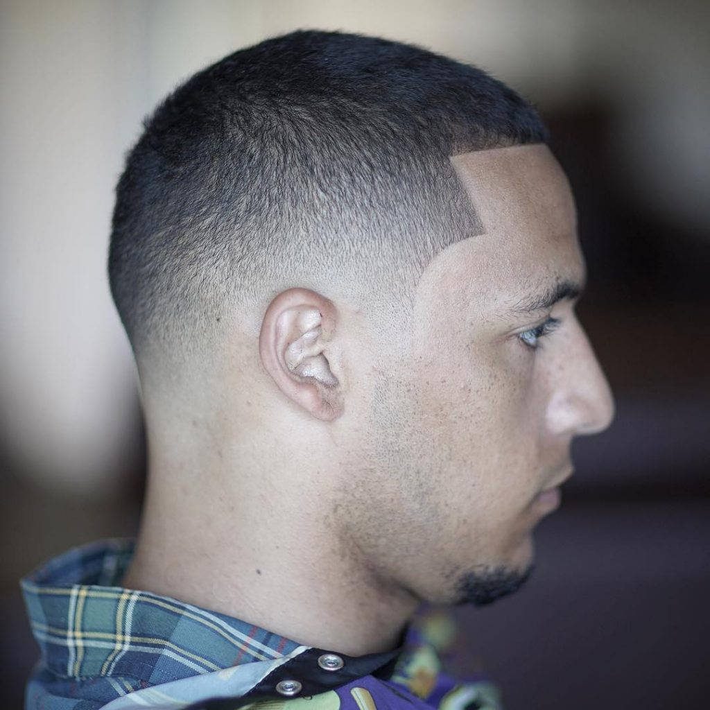Men’s haircut wallpaper sharp line-up precise skin fade modern short-fade hairstyle background