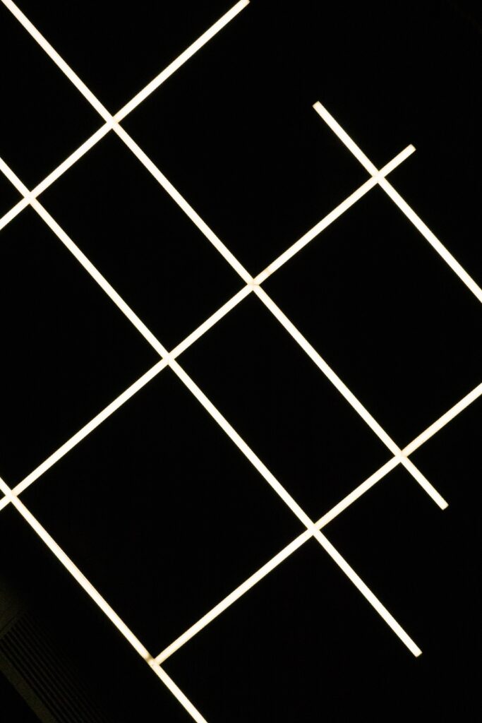 Modern Minimalist Black Background with Geometric White Grid Wallpaper