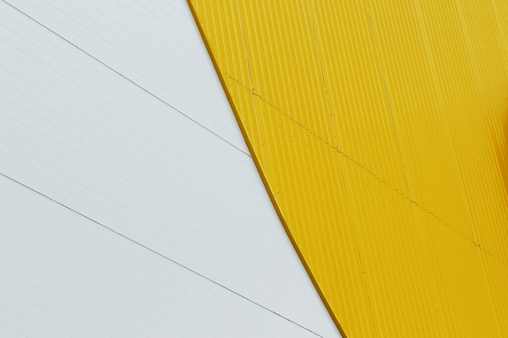 Modern Minimalist Wallpaper: Bold Yellow & White Textured Panels