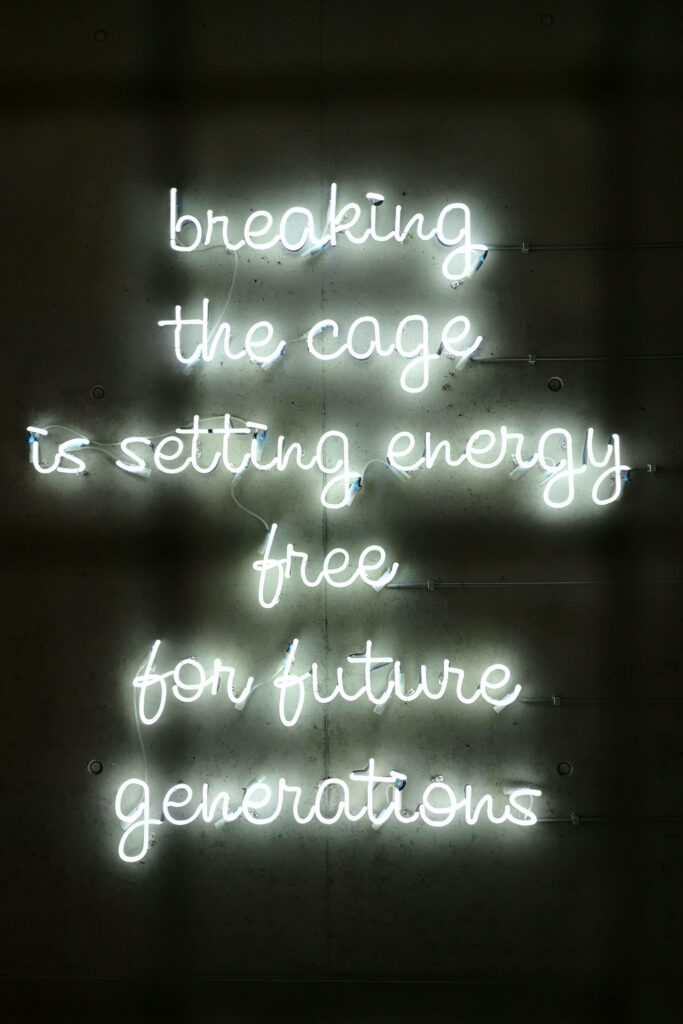 Modern Neon Wallpaper: 'Breaking the Cage' Motivational Design