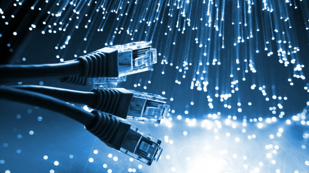 Glowing Fiber Optic Network Cables Wallpaper for IT Data Communication