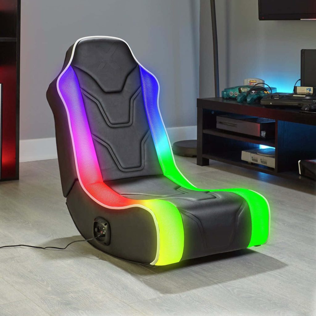Modern black floor gaming chair with RGB LED strips for immersive gaming setups wallpaper