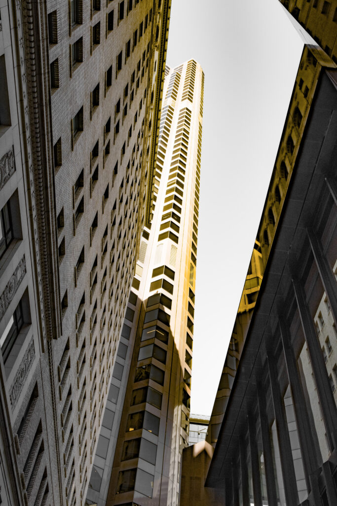 Dramatic Urban Skyscraper Wallpaper: Modern Architecture in Sunlight