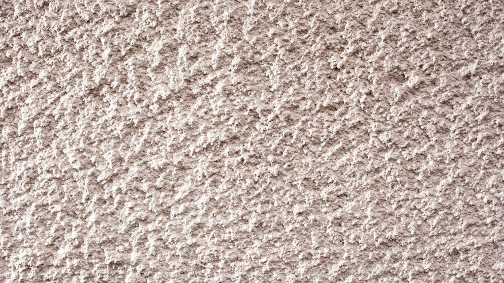 Modern Textured Wallpaper: Soft Neutral Tone with Rough Patterns
