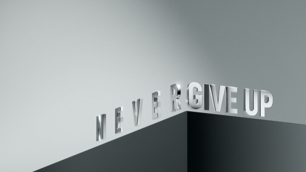 Never Give Up Wallpaper: Bold Metallic Design for Modern Resilience