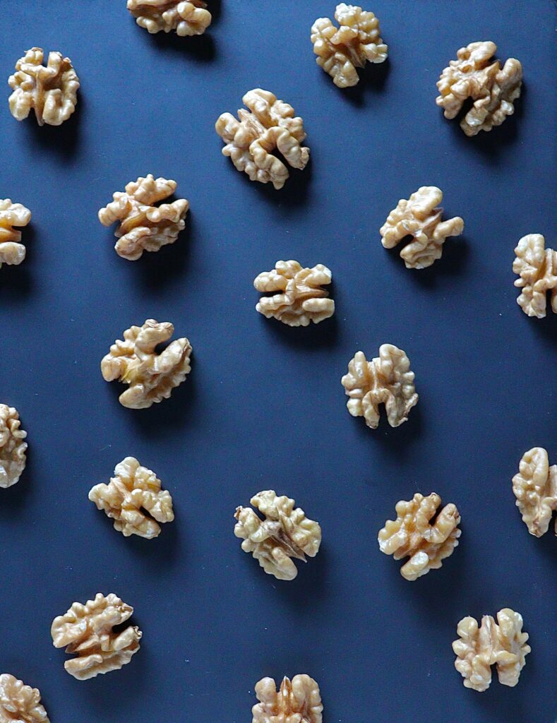 Modern Walnut Pattern Wallpaper on Deep Blue Background