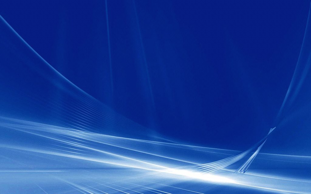 Windows Vista style wallpaper with abstract light beams on deep blue gradient background