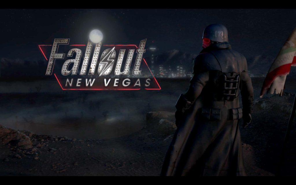 Fallout New Vegas wallpaper NCR Ranger in combat armor overlooks glowing New Vegas skyline at night