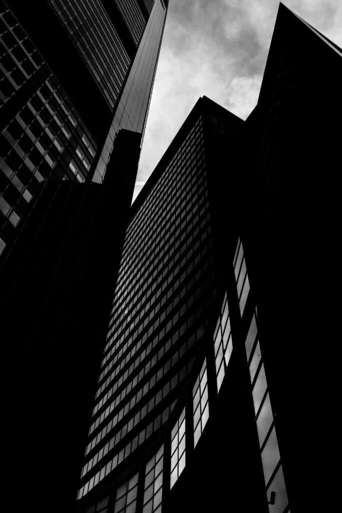 Monochromatic Skyscrapers: Dramatic Urban Wallpaper Background