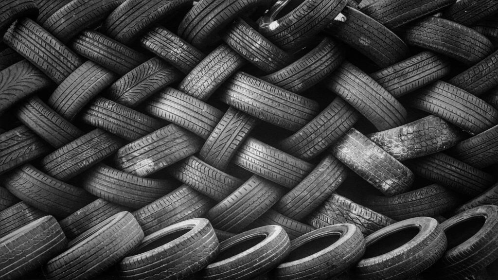 Textured Dark Grey Tire Pattern Wallpaper Background