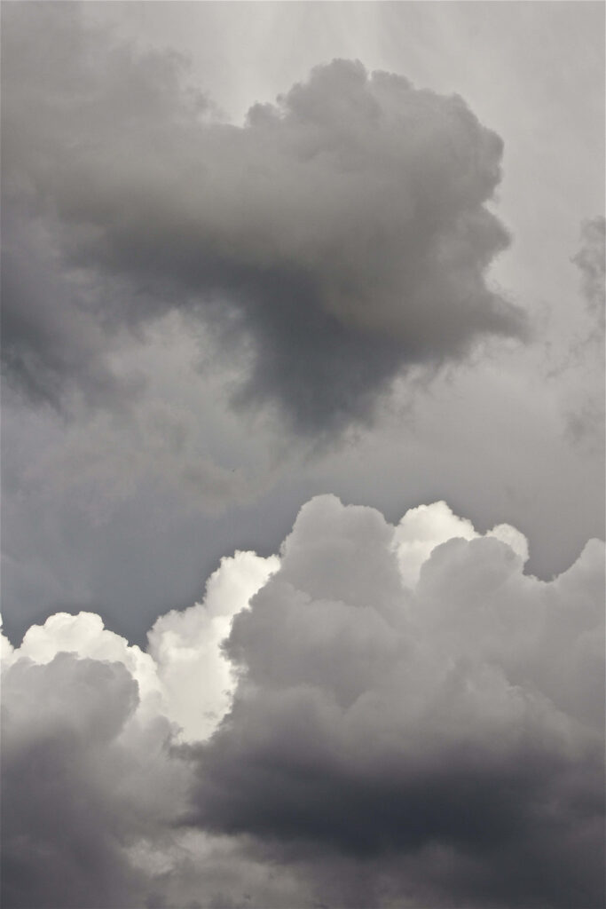 Monochrome Clouds Wallpaper: Dark vs. Light Dramatic Background